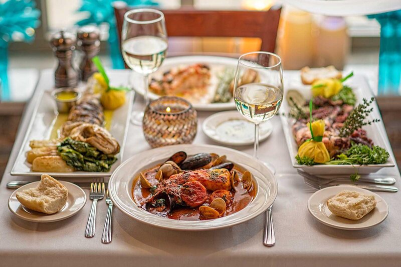 Set table with focus on clams and mussels entree