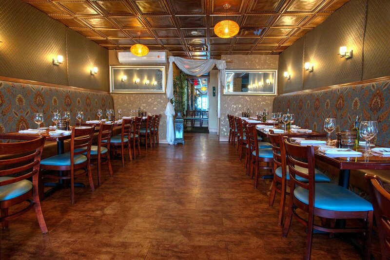 View of dining room with set tables